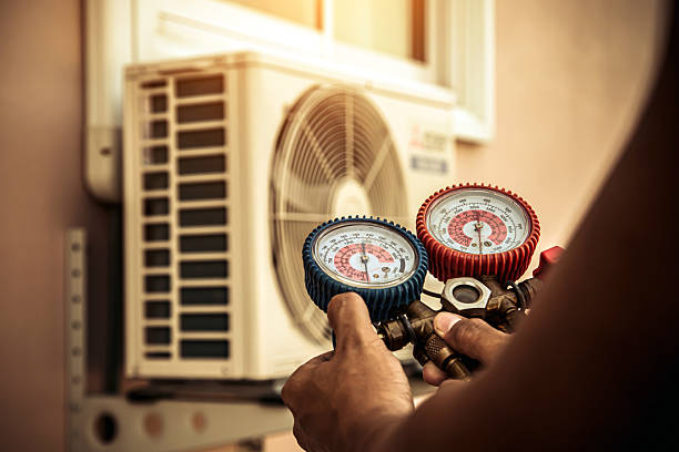 Professional Heat Pump Repair technician working in Bonner Springs, KS